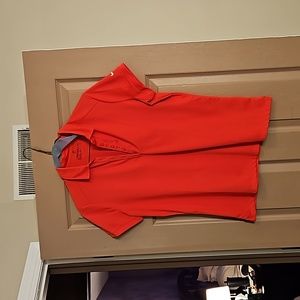 Raspberry  ish. Golf shirt